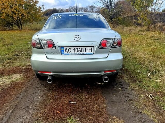 Серый Мазда 6, объемом двигателя 2 л и пробегом 208 тыс. км за 4200 $, фото 2 на Automoto.ua