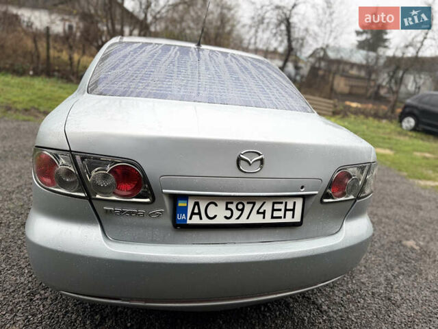 Серый Мазда 6, объемом двигателя 1.8 л и пробегом 256 тыс. км за 3999 $, фото 9 на Automoto.ua
