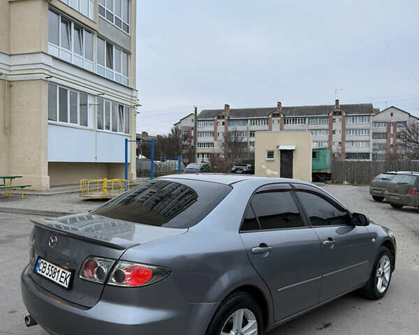 Серый Мазда 6, объемом двигателя 2 л и пробегом 323 тыс. км за 4750 $, фото 5 на Automoto.ua