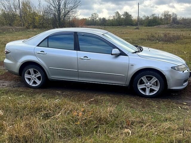 Серый Мазда 6, объемом двигателя 2 л и пробегом 208 тыс. км за 4200 $, фото 4 на Automoto.ua