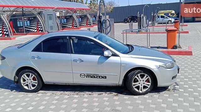 Сірий Мазда 6, об'ємом двигуна 2 л та пробігом 333 тис. км за 4700 $, фото 4 на Automoto.ua