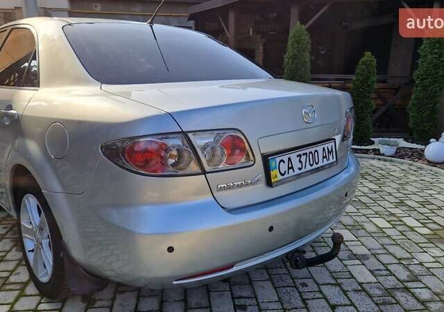 Сірий Мазда 6, об'ємом двигуна 1.8 л та пробігом 253 тис. км за 5400 $, фото 4 на Automoto.ua