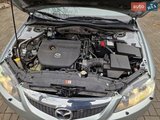 Серый Мазда 6, объемом двигателя 2 л и пробегом 201 тыс. км за 6300 $, фото 12 на Automoto.ua