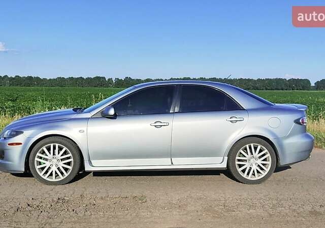 Серый Мазда 6, объемом двигателя 2.26 л и пробегом 245 тыс. км за 6050 $, фото 1 на Automoto.ua