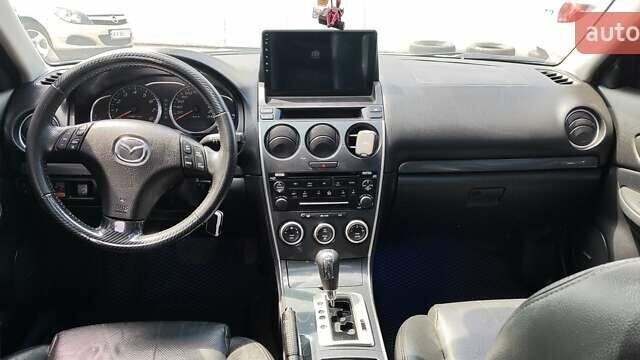 Серый Мазда 6, объемом двигателя 2 л и пробегом 205 тыс. км за 6400 $, фото 5 на Automoto.ua