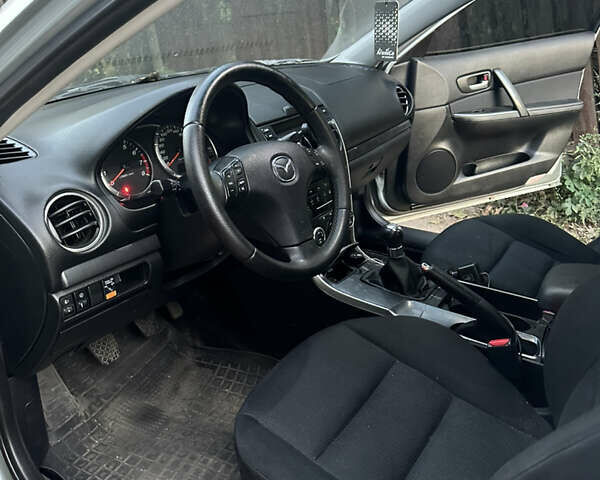 Серый Мазда 6, объемом двигателя 1.8 л и пробегом 235 тыс. км за 4400 $, фото 2 на Automoto.ua