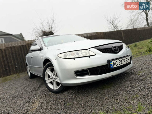 Серый Мазда 6, объемом двигателя 1.8 л и пробегом 256 тыс. км за 3999 $, фото 2 на Automoto.ua