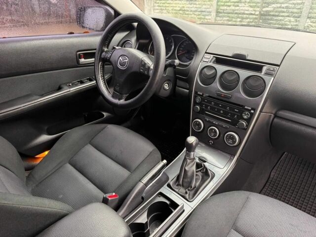Серый Мазда 6, объемом двигателя 2 л и пробегом 171 тыс. км за 5700 $, фото 12 на Automoto.ua