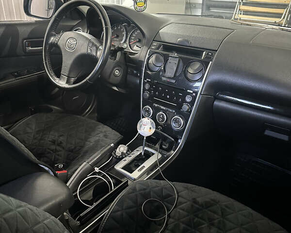 Серый Мазда 6, объемом двигателя 2 л и пробегом 244 тыс. км за 4600 $, фото 5 на Automoto.ua