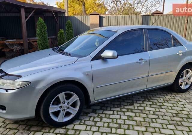 Сірий Мазда 6, об'ємом двигуна 1.8 л та пробігом 253 тис. км за 5400 $, фото 9 на Automoto.ua