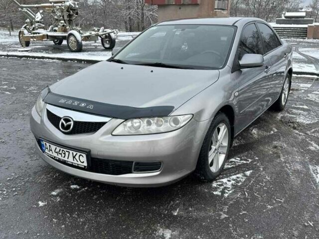 Серый Мазда 6, объемом двигателя 2 л и пробегом 261 тыс. км за 6300 $, фото 1 на Automoto.ua