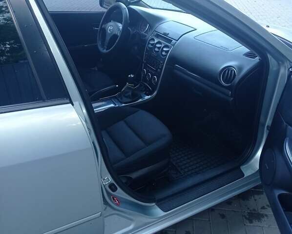 Серый Мазда 6, объемом двигателя 2 л и пробегом 252 тыс. км за 5700 $, фото 11 на Automoto.ua