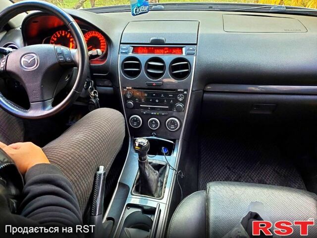 Серый Мазда 6, объемом двигателя 2.3 л и пробегом 250 тыс. км за 5800 $, фото 2 на Automoto.ua
