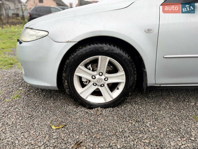 Серый Мазда 6, объемом двигателя 1.8 л и пробегом 256 тыс. км за 3999 $, фото 5 на Automoto.ua