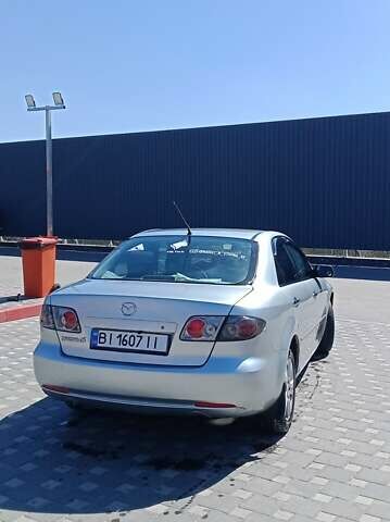 Сірий Мазда 6, об'ємом двигуна 2 л та пробігом 333 тис. км за 4700 $, фото 3 на Automoto.ua