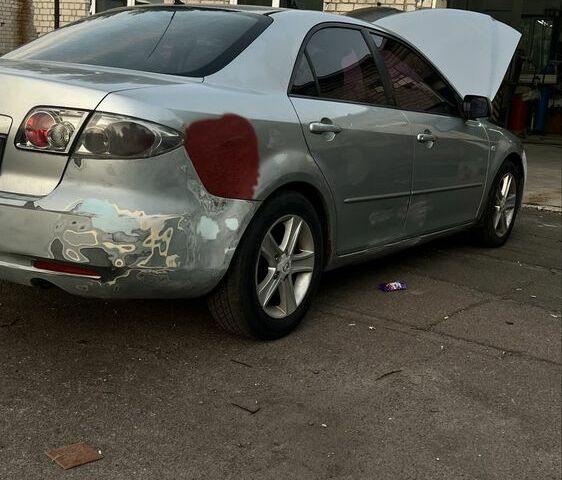 Сірий Мазда 6, об'ємом двигуна 2 л та пробігом 370 тис. км за 2714 $, фото 4 на Automoto.ua