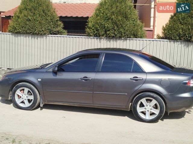 Сірий Мазда 6, об'ємом двигуна 2 л та пробігом 245 тис. км за 4150 $, фото 4 на Automoto.ua