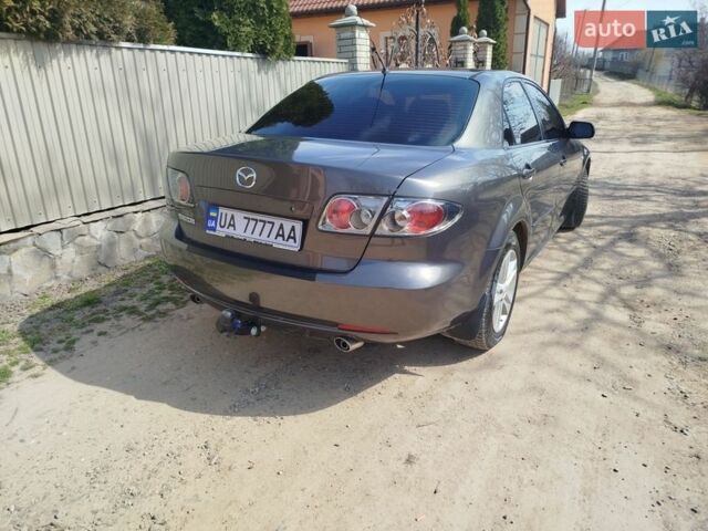 Сірий Мазда 6, об'ємом двигуна 2 л та пробігом 245 тис. км за 4150 $, фото 7 на Automoto.ua