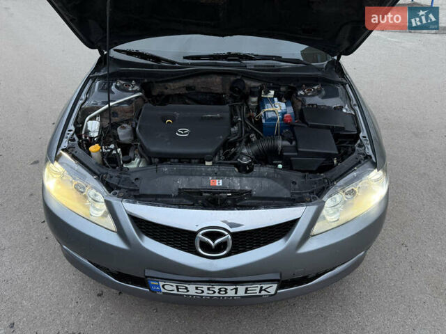 Серый Мазда 6, объемом двигателя 2 л и пробегом 323 тыс. км за 4750 $, фото 12 на Automoto.ua