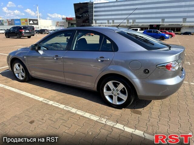 Серый Мазда 6, объемом двигателя 1.8 л и пробегом 239 тыс. км за 5500 $, фото 2 на Automoto.ua