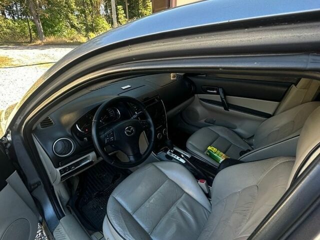 Серый Мазда 6, объемом двигателя 2 л и пробегом 332 тыс. км за 4750 $, фото 2 на Automoto.ua