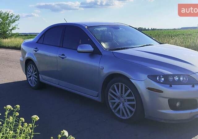 Серый Мазда 6, объемом двигателя 2.26 л и пробегом 245 тыс. км за 6050 $, фото 3 на Automoto.ua