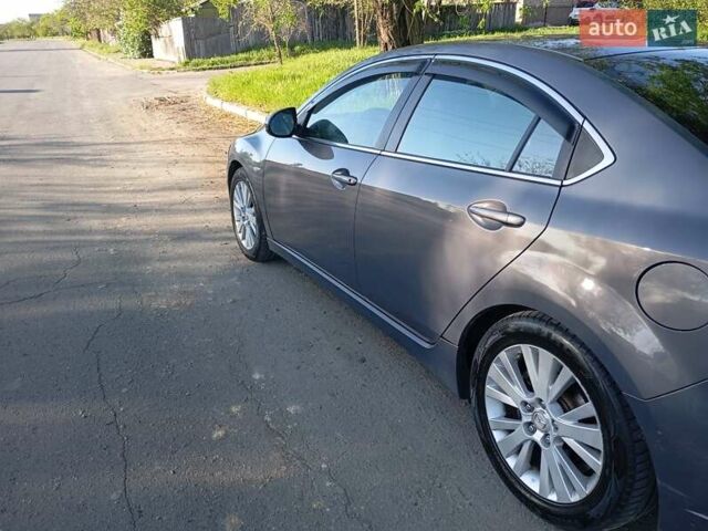 Серый Мазда 6, объемом двигателя 1.8 л и пробегом 182 тыс. км за 7500 $, фото 10 на Automoto.ua