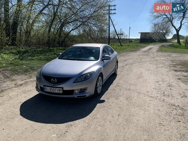Серый Мазда 6, объемом двигателя 2 л и пробегом 230 тыс. км за 6800 $, фото 1 на Automoto.ua
