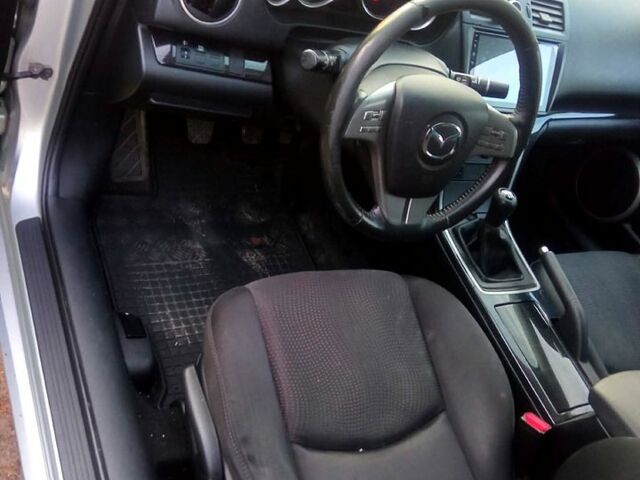 Серый Мазда 6, объемом двигателя 2 л и пробегом 344 тыс. км за 5999 $, фото 2 на Automoto.ua