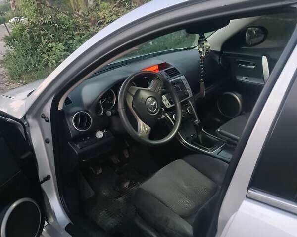 Серый Мазда 6, объемом двигателя 1.8 л и пробегом 218 тыс. км за 7300 $, фото 8 на Automoto.ua