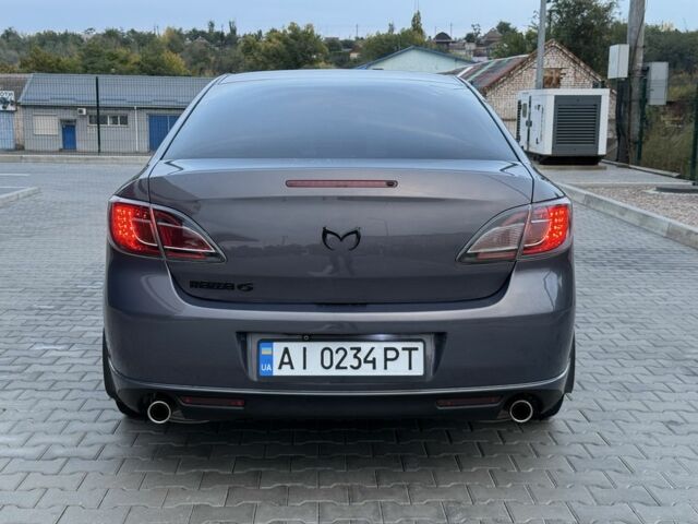 Серый Мазда 6, объемом двигателя 2 л и пробегом 245 тыс. км за 7400 $, фото 3 на Automoto.ua