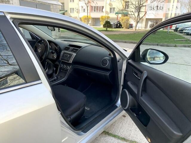 Серый Мазда 6, объемом двигателя 1.8 л и пробегом 128 тыс. км за 6950 $, фото 17 на Automoto.ua