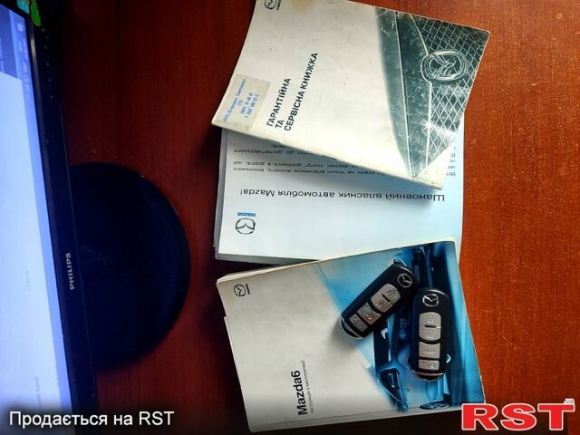 Серый Мазда 6, объемом двигателя 2.5 л и пробегом 264 тыс. км за 7100 $, фото 7 на Automoto.ua