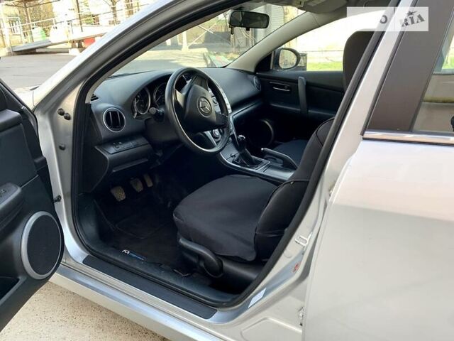 Серый Мазда 6, объемом двигателя 1.8 л и пробегом 128 тыс. км за 6950 $, фото 11 на Automoto.ua