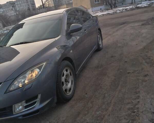 Серый Мазда 6, объемом двигателя 1.8 л и пробегом 195 тыс. км за 6800 $, фото 3 на Automoto.ua