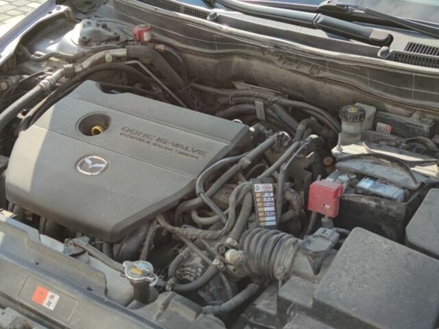 Серый Мазда 6, объемом двигателя 2 л и пробегом 295 тыс. км за 6700 $, фото 6 на Automoto.ua