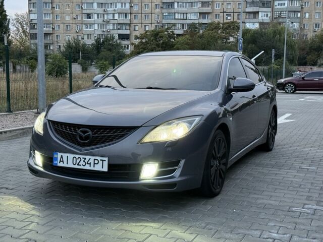Серый Мазда 6, объемом двигателя 2 л и пробегом 245 тыс. км за 7400 $, фото 6 на Automoto.ua