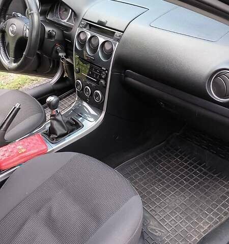 Сірий Мазда 6, об'ємом двигуна 2 л та пробігом 233 тис. км за 6200 $, фото 1 на Automoto.ua