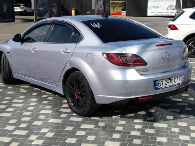 Серый Мазда 6, объемом двигателя 2 л и пробегом 295 тыс. км за 6700 $, фото 1 на Automoto.ua
