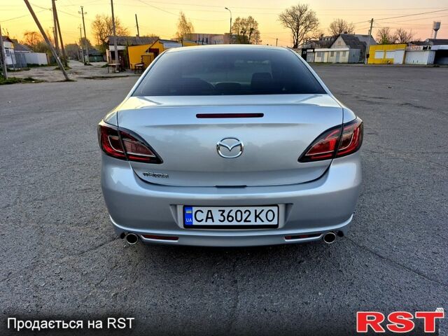 Серый Мазда 6, объемом двигателя 2 л и пробегом 280 тыс. км за 6000 $, фото 3 на Automoto.ua
