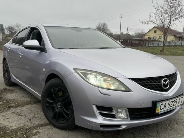 Серый Мазда 6, объемом двигателя 1.8 л и пробегом 232 тыс. км за 6100 $, фото 1 на Automoto.ua