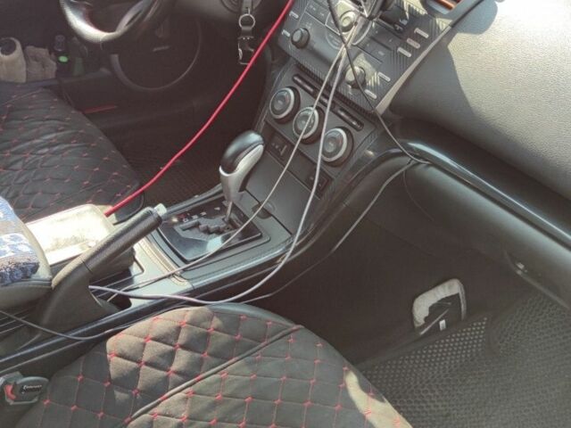 Серый Мазда 6, объемом двигателя 2 л и пробегом 295 тыс. км за 6700 $, фото 3 на Automoto.ua