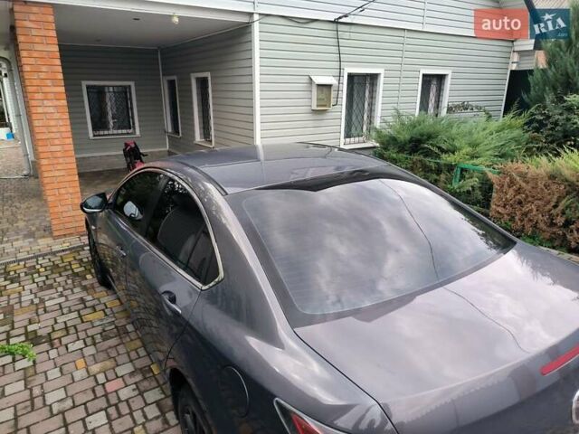 Серый Мазда 6, объемом двигателя 2 л и пробегом 212 тыс. км за 6500 $, фото 1 на Automoto.ua