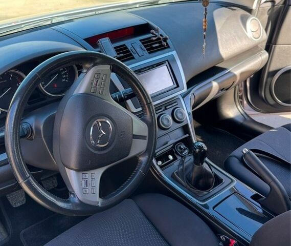 Серый Мазда 6, объемом двигателя 2 л и пробегом 223 тыс. км за 6800 $, фото 1 на Automoto.ua