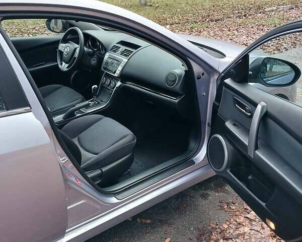 Серый Мазда 6, объемом двигателя 2 л и пробегом 200 тыс. км за 5500 $, фото 5 на Automoto.ua
