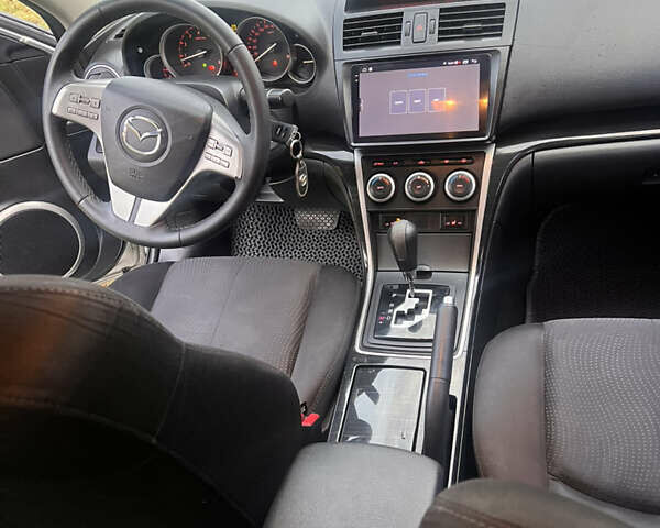 Серый Мазда 6, объемом двигателя 2 л и пробегом 230 тыс. км за 8500 $, фото 3 на Automoto.ua