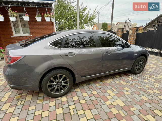 Серый Мазда 6, объемом двигателя 1.8 л и пробегом 274 тыс. км за 7699 $, фото 2 на Automoto.ua