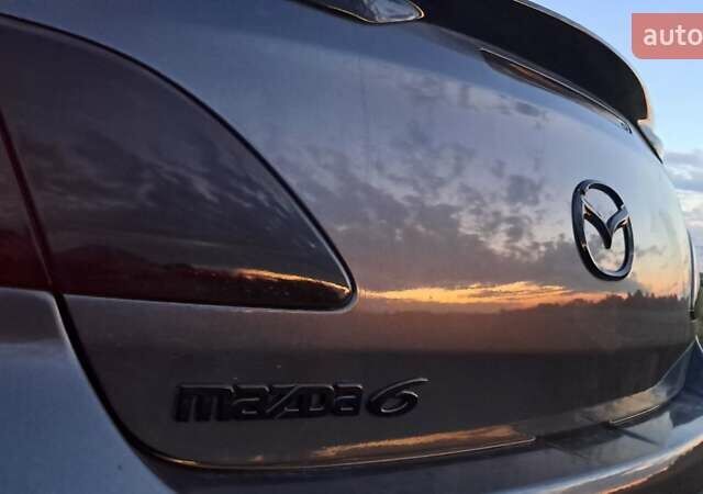 Серый Мазда 6, объемом двигателя 2.5 л и пробегом 167 тыс. км за 7800 $, фото 27 на Automoto.ua