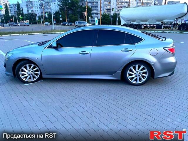 Сірий Мазда 6, об'ємом двигуна 2.2 л та пробігом 310 тис. км за 6350 $, фото 5 на Automoto.ua