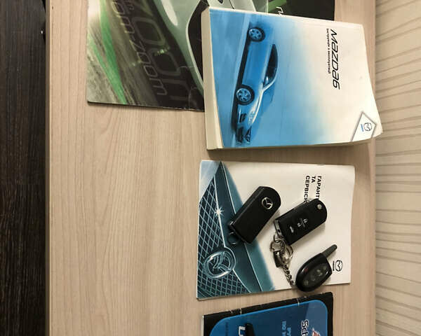 Серый Мазда 6, объемом двигателя 2 л и пробегом 106 тыс. км за 10000 $, фото 25 на Automoto.ua